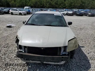 2012 Mitsubishi Galant FE z VIN 4A32B2FF3CE015428, wystawiony jako Copart lot #72249084 z przebiegiem 262 721 mil mil oraz Szkoda całkowita • Salvage title. Historia ofert i sprzedaży dostępna na DreamBid. Obrazek 5.