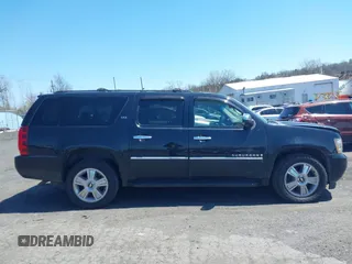 2009 Chevrolet Suburban LTZ with VIN 1GNFK36399J124158, listed as a IAAI auction lot 42063097 with 204,856 mi miles. Bid and sale history available at carsss.com. Image 13.