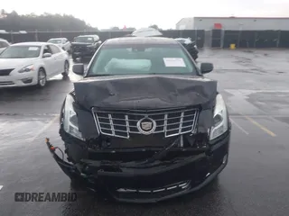 2013 Cadillac XTS Premium z VIN 2G61S5S39D9112491, wystawiony jako IAAI lot #42216373 z przebiegiem 145 338 mil mil oraz . Historia ofert i sprzedaży dostępna na DreamBid. Obrazek 12.