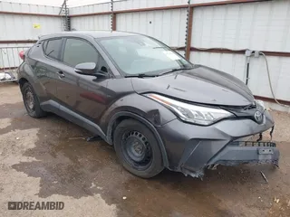 2020 Toyota C-HR LE with VIN JTNKHMBX0L1073916, listed as a IAAI auction lot 41720784 with 96,730 mi miles. Bid and sale history available at carsss.com. Image 1.