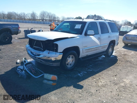 2003 GMC Yukon SLT with VIN 1GKEC13Z13J197955, listed as a IAAI auction lot 41586841 with 208,752 mi miles. Bid and sale history available at carsss.com. Image 2.