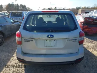 2014 Subaru Forester 2.5i with VIN JF2SJAAC4EG414600, listed as a IAAI auction lot 41006289 with 128,611 mi miles. Bid and sale history available at carsss.com. Image 16.