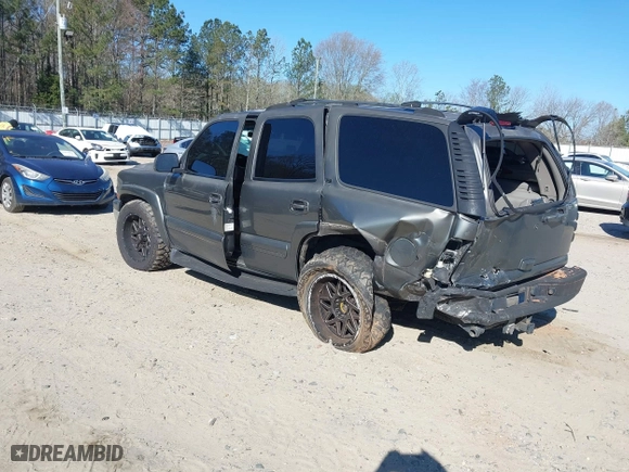 2002 Chevrolet Tahoe LT with VIN 1GNEK13Z22J279570, listed as a IAAI auction lot 41858543 with 378,318 mi miles. Bid and sale history available at carsss.com. Image 3.
