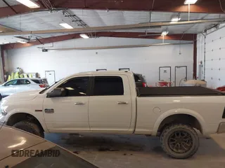 2015 Ram 1500 Laramie Limited with VIN 1C6RR7WM6FS678840, listed as a IAAI auction lot 42040449 with Not provided miles and . Bid and sale history available at DreamBid. Image 14.