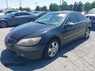 2005 Acura RL with VIN JH4KB16575C007995, listed as a IAAI auction lot 42638944 with 241,591 mi miles and . Bid and sale history available at DreamBid. Image 2.