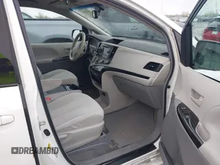 2012 Toyota Sienna LE AAS with VIN 5TDKK3DC3CS208853, listed as a IAAI auction lot 42205012 with 197,286 mi miles. Bid and sale history available at carsss.com. Image 5.
