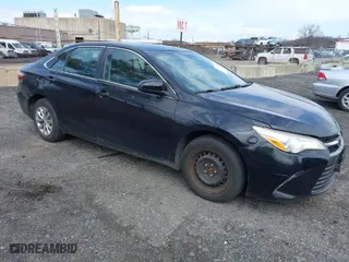 2015 Toyota Camry Hybrid LE with VIN 4T1BD1FK3FU164092, listed as a IAAI auction lot 41886726 with 396,189 mi miles. Bid and sale history available at carsss.com. Image 1.
