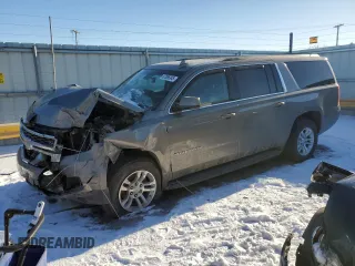 2018 Chevrolet Suburban LS with VIN 1GNSKGKC1JR201493, listed as a Copart auction lot 87856345 with Not Provided miles and Salvage Title. Bid and sale history available at DreamBid. Image 1.