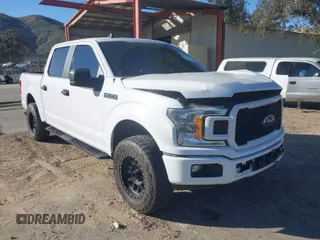 2020 Ford F-150 XL with VIN 1FTEW1CP7LKD24719, listed as a IAAI auction lot 41670273 with 57,188 mi miles. Bid and sale history available at carsss.com. Image 1.