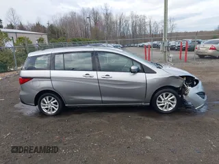 2012 Mazda 5 Sport with VIN JM1CW2BLXC0107933, listed as a IAAI auction lot 41813231 with 164,395 mi miles and . Bid and sale history available at DreamBid. Image 14.