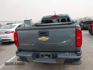 2018 Chevrolet Colorado 2WD LT z VIN 1GCGSCEN0J1223004, wystawiony jako IAAI lot #41782378 z przebiegiem 67 818 mil mil oraz . Historia ofert i sprzedaży dostępna na DreamBid. Obrazek 16.