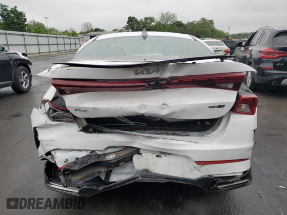2022 Kia K5 GT-Line z VIN 5XXG64J20NG122075, wystawiony jako Copart lot #56356875 z przebiegiem 54 554 mil mil oraz Szkoda całkowita • Salvage title. Historia ofert i sprzedaży dostępna na DreamBid. Obrazek 6.