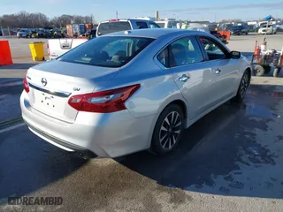 2018 Nissan Altima 2.5 SV with VIN 1N4AL3APXJC265944, listed as a IAAI auction lot 41052902 with 142,023 mi miles. Bid and sale history available at carsss.com. Image 4.