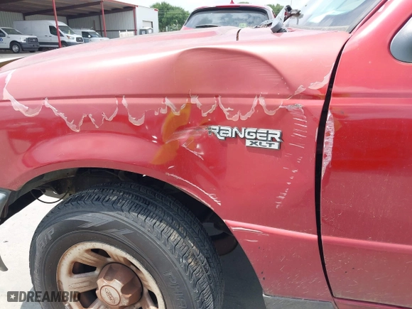 2004 Ford Ranger XL with VIN 1FTYR14U34PA93928, listed as a IAAI auction lot 42104400 with 121,776 mi miles. Bid and sale history available at carsss.com. Image 6.