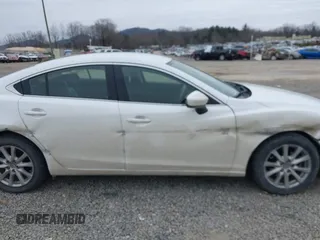 2015 Mazda 6 i Sport with VIN JM1GJ1U57F1183035, listed as a IAAI auction lot 41384011 with 152,172 mi miles. Bid and sale history available at carsss.com. Image 13.