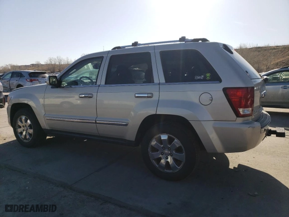 2010 Jeep Grand Cherokee Limited with VIN 1J4RR5GT3AC135686, listed as a Copart auction lot 52961465 with 136,034 mi miles and Salvage Title. Bid and sale history available at carsss.com. Image 2.