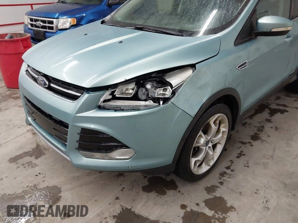 2013 Ford Escape Titanium with VIN 1FMCU9J9XDUC60029, listed as a IAAI auction lot 41936948 with 184,012 mi miles and . Bid and sale history available at DreamBid. Image 6.