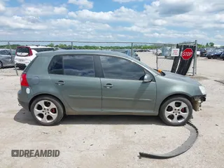 2007 Volkswagen Rabbit z VIN WVWDR71K17W224630, wystawiony jako IAAI lot #42113287 z przebiegiem 205 748 mil mil oraz . Historia ofert i sprzedaży dostępna na DreamBid. Obrazek 13.