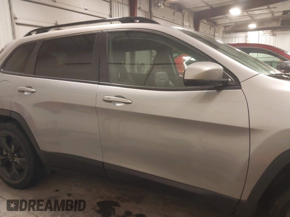 2019 Jeep Cherokee Latitude Plus with VIN 1C4PJMLX2KD427395, listed as a IAAI auction lot 41586532 with 84,033 mi miles and . Bid and sale history available at DreamBid. Image 14.