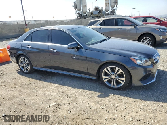 2015 Mercedes-Benz E 350 Sport with VIN WDDHF5KB9FB088305, listed as a Copart auction lot 54849945 with 124,315 mi miles and Salvage title. Bid and sale history available at DreamBid. Image 4.