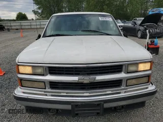 1999 Chevrolet Tahoe Z71 with VIN 1GNEK13R1XJ365475, listed as a Copart auction lot 56258175 with 184,647 mi miles and Clean Title. Bid and sale history available at DreamBid. Image 5.