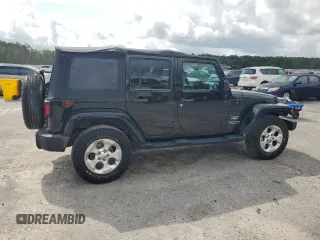 2013 Jeep Wrangler Unlimited Sahara with VIN 1C4HJWEG9DL701391, listed as a Copart auction lot 60492325 with 117,584 mi miles and Salvage title. Bid and sale history available at DreamBid. Image 3.
