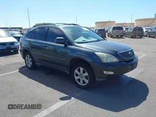 2004 Lexus RX 330 with VIN JTJGA31UX40001738, listed as a IAAI auction lot 41762207 with 202,440 mi miles. Bid and sale history available at carsss.com. Image 1.