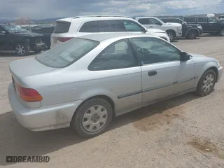 1998 Honda Civic DX with VIN 1HGEJ6229WL131263, listed as a IAAI auction lot 42050060 with 144,337 mi miles. Bid and sale history available at carsss.com. Image 4.