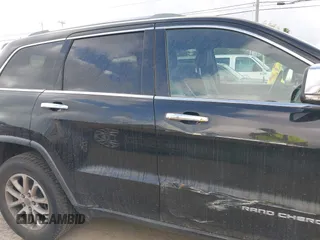 2014 Jeep Grand Cherokee Limited with VIN 1C4RJFBG8EC151465, listed as a IAAI auction lot 42561814 with 159,789 mi miles and . Bid and sale history available at DreamBid. Image 13.
