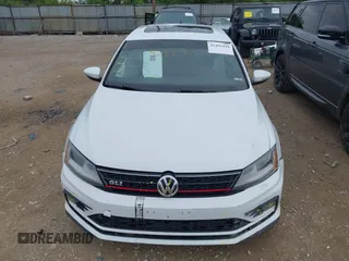 2017 Volkswagen Jetta GLI z VIN 3VW4T7AJ8HM349440, wystawiony jako IAAI lot #42491919 z przebiegiem 141 764 mil mil oraz . Historia ofert i sprzedaży dostępna na DreamBid. Obrazek 13.