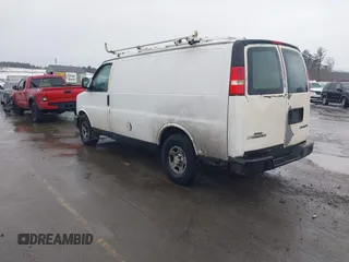2005 Chevrolet Express Cargo Van with VIN 1GCFG15X651249132, listed as a IAAI auction lot 41736308 with 1,939 mi miles. Bid and sale history available at carsss.com. Image 3.