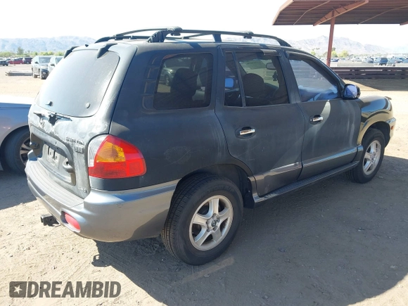 2004 Hyundai Santa Fe GLS with VIN KM8SC73E14U831372, listed as a IAAI auction lot 42297078 with 100,691 mi miles and . Bid and sale history available at DreamBid. Image 4.