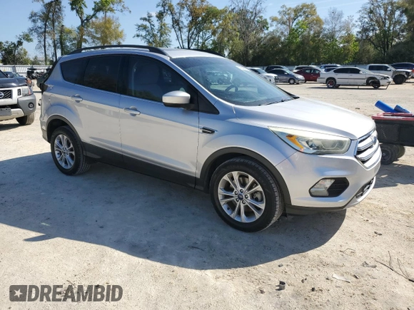 2017 Ford Escape SE with VIN 1FMCU0G96HUB44335, listed as a Copart auction lot 49849585 with 98,097 mi miles and Salvage Title. Bid and sale history available at carsss.com. Image 4.