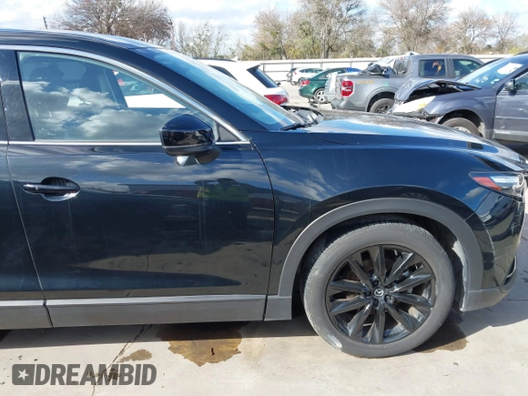 2023 Mazda CX-9 Touring Plus with VIN JM3TCBAY2P0657761, listed as a IAAI auction lot 41125586 with 12,425 mi miles and . Bid and sale history available at DreamBid. Image 21.