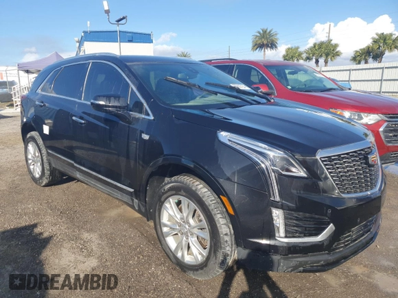 2022 Cadillac XT5 FWD Luxury z VIN 1GYKNAR4XNZ165234, wystawiony jako Copart lot #85392754 z przebiegiem 36 100 mil mil oraz Nie do naprawy • Non repairable. Historia ofert i sprzedaży dostępna na DreamBid. Obrazek 4.