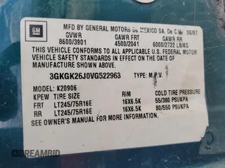 1997 GMC Suburban z VIN 3GKGK26J0VG522963, wystawiony jako Copart lot #56804105 z przebiegiem 297 544 mil mil oraz Tytuł czysty. Historia ofert i sprzedaży dostępna na DreamBid. Obrazek 13.