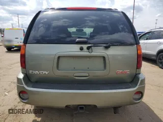 2003 GMC Envoy SLT with VIN 1GKDT13S032112192, listed as a Copart auction lot 54351985 with 297,007 mi miles and Clean Title. Bid and sale history available at carsss.com. Image 6.