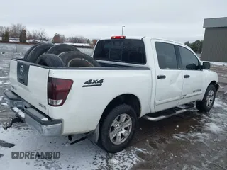 2004 Nissan Titan LE with VIN 1N6AA07B54N513193, listed as a IAAI auction lot 41502380 with 193,878 mi miles and . Bid and sale history available at DreamBid. Image 4.