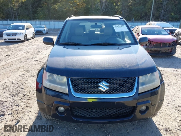 2011 Suzuki Grand Vitara Limited z VIN JS3TE0D72B4100152, wystawiony jako IAAI lot #40676416 z przebiegiem 193 097 mil mil oraz . Historia ofert i sprzedaży dostępna na DreamBid. Obrazek 12.