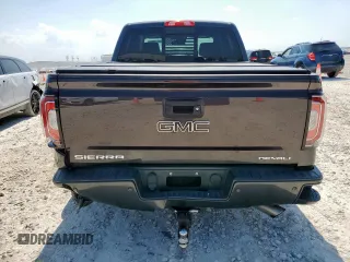 2016 GMC Sierra 1500 Denali z VIN 3GTU2PEC9GG285360, wystawiony jako Copart lot #58137055 z przebiegiem 94 719 mil mil oraz Szkoda całkowita • Salvage title. Historia ofert i sprzedaży dostępna na DreamBid. Obrazek 6.