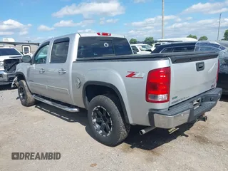 2012 GMC Sierra 1500 SLE z VIN 3GTP2VE71CG159590, wystawiony jako IAAI lot #42291489 z przebiegiem 167 528 mil mil oraz . Historia ofert i sprzedaży dostępna na DreamBid. Obrazek 3.