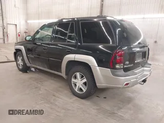 2004 Chevrolet TrailBlazer LS with VIN 1GNDT13S942308362, listed as a IAAI auction lot 41913292 with 153,458 mi miles. Bid and sale history available at carsss.com. Image 3.