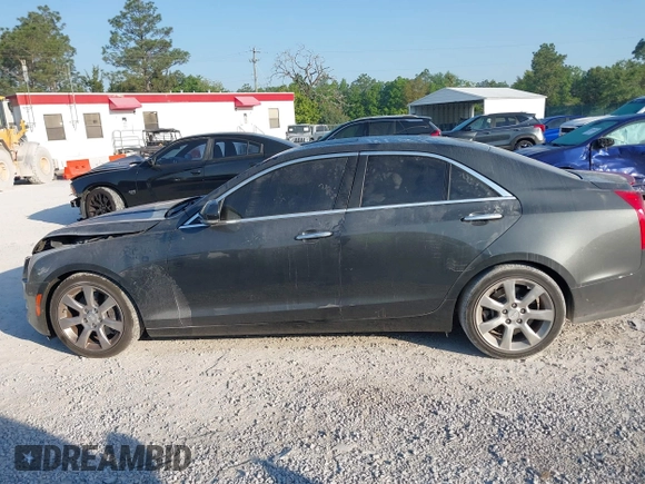 2015 Cadillac ATS Sedan Luxury RWD with VIN 1G6AB5RX4F0122156, listed as a IAAI auction lot 42012891 with 137,879 mi miles. Bid and sale history available at carsss.com. Image 14.