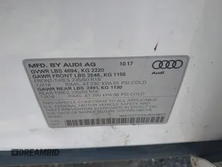 2018 Audi Q3 Premium with VIN WA1ECCFS3JR016577, listed as a IAAI auction lot 42177891 with 91,876 mi miles and . Bid and sale history available at DreamBid. Image 9.