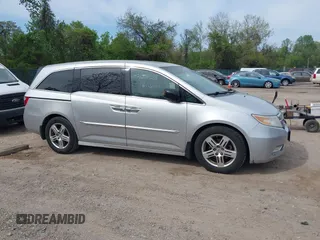2012 Honda Odyssey Touring with VIN 5FNRL5H92CB055473, listed as a IAAI auction lot 42128601 with 163,901 mi miles. Bid and sale history available at carsss.com. Image 13.