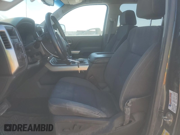 2018 Chevrolet Silverado 1500 LT with VIN 3GCUKREC2JG259864, listed as a Copart auction lot 49451735 with 146,576 mi miles and Salvage Title. Bid and sale history available at DreamBid. Image 7.