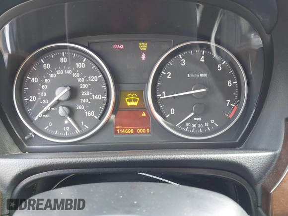 2011 BMW 3 Series 328i with VIN WBAPH5C5XBF216401, listed as a IAAI auction lot 41890987 with 114,698 mi miles and . Bid and sale history available at carsss.com. Image 7.