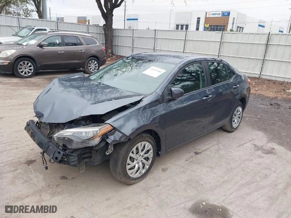 2019 Toyota Corolla L with VIN 5YFBURHE6KP937767, listed as a IAAI auction lot 41637686 with 115,998 mi miles. Bid and sale history available at carsss.com. Image 2.