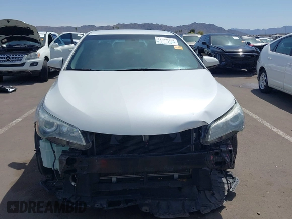 2015 Toyota Camry XLE with VIN 4T1BF1FK4FU477825, listed as a IAAI auction lot 41988429 with 156,886 mi miles and . Bid and sale history available at DreamBid. Image 13.