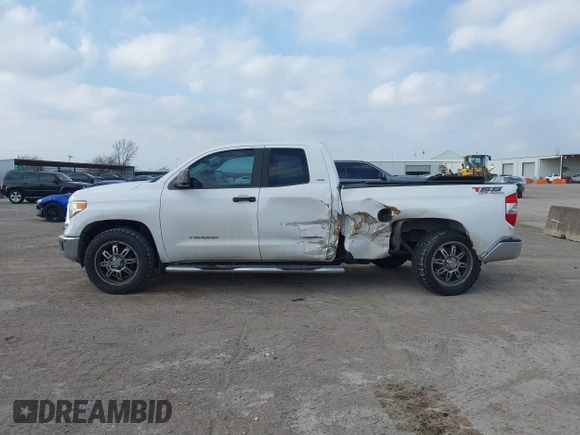 2016 Toyota Tundra SR z VIN 5TFRM5F10GX097792, wystawiony jako IAAI lot #41516069 z przebiegiem 199 598 mil mil oraz . Historia ofert i sprzedaży dostępna na DreamBid. Obrazek 6.